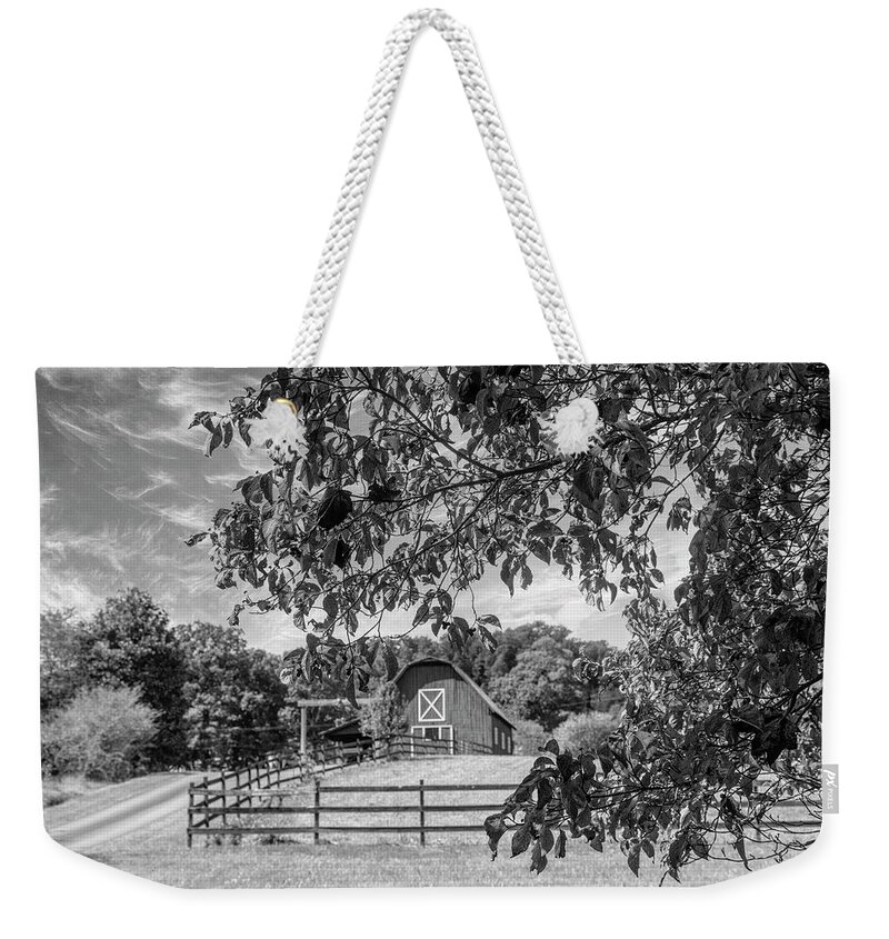 Barns Weekender Tote Bag featuring the photograph Black and White Country Barn in the Dogwoods by Debra and Dave Vanderlaan