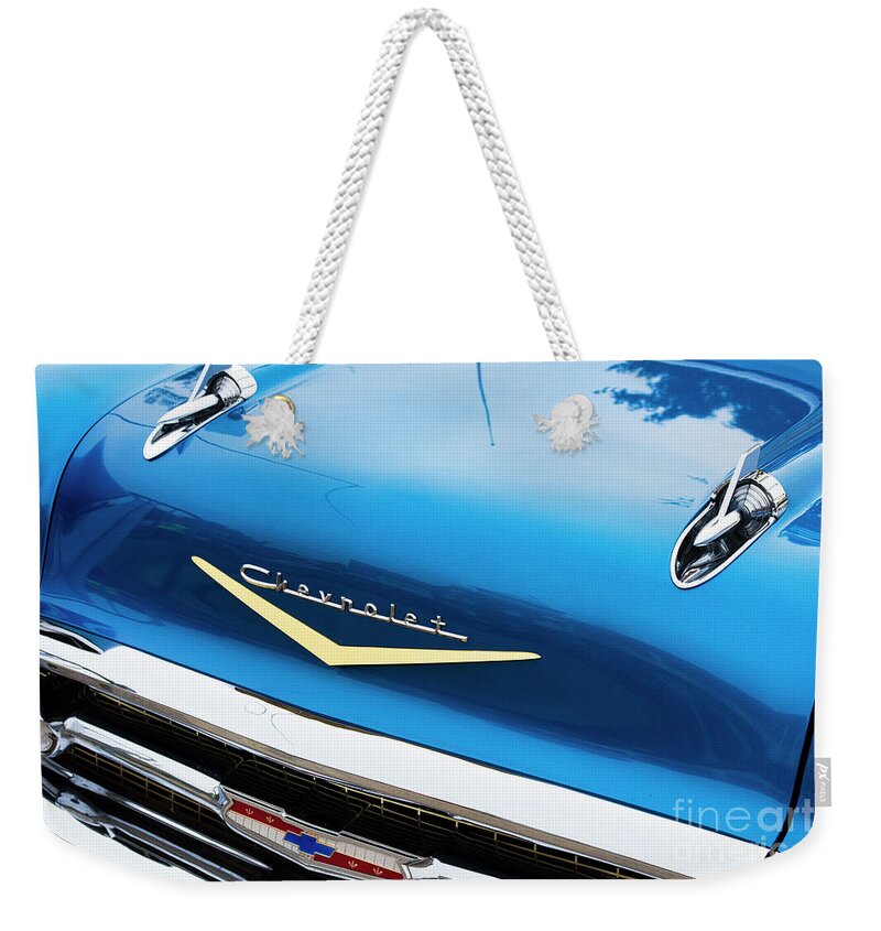 Chevrolet Weekender Tote Bag featuring the photograph Blue 1957 Chevrolet Bel Air Hood by Tim Gainey