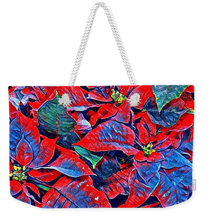 Blue Weekender Tote Bag featuring the photograph Blue and Red Poinsettias by Vivian Aumond
