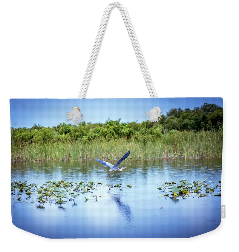 Blue Heron Weekender Tote Bag featuring the photograph Blue Heron Flight by Blair Damson