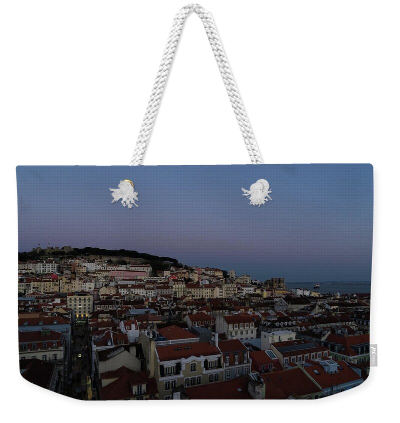 Blue Hour Weekender Tote Bag featuring the photograph Blue Hour with a Hint of Pink over Lisbon Portugal by Georgia Mizuleva