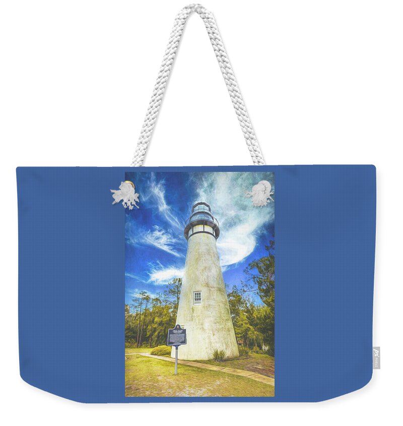 Lighthouse Weekender Tote Bag featuring the photograph Blue Sky and White Clouds at the Amelia Island Lighthouse Water by Debra and Dave Vanderlaan