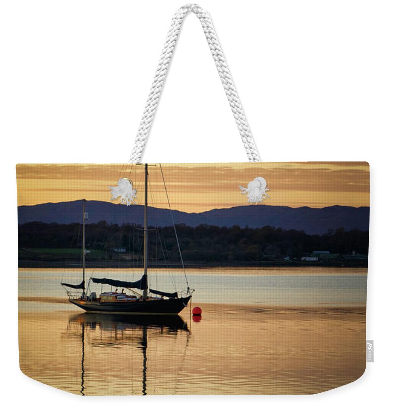 Blue Weekender Tote Bag featuring the photograph Boat On A Lake at Sunset by Rick Deacon