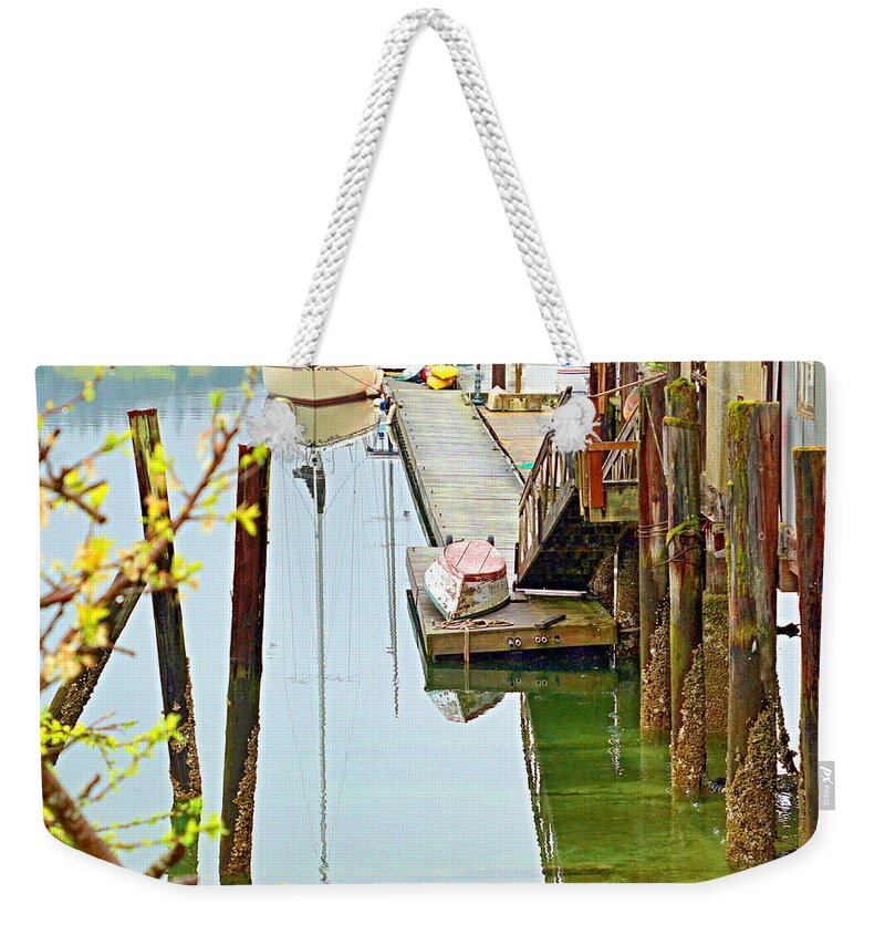 Seascape Weekender Tote Bag featuring the photograph Boats at Rest by Bill TALICH