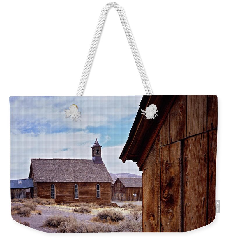 California Weekender Tote Bag featuring the photograph Bodie Church by Tom Daniel