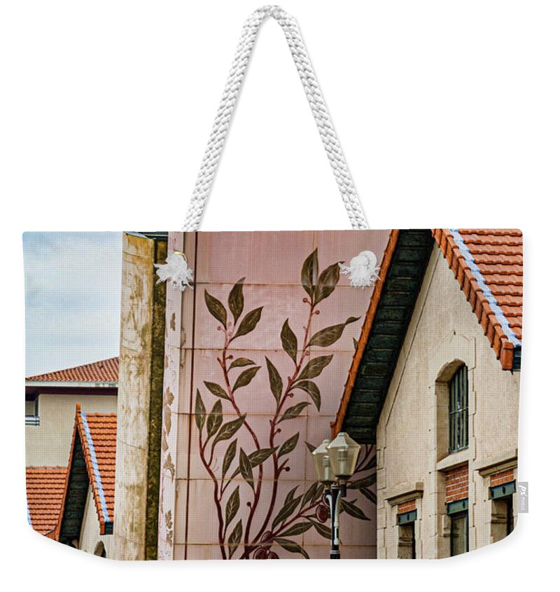 Programmatic Weekender Tote Bag featuring the photograph Bookshelf Books in Provence France by Matthew Bamberg