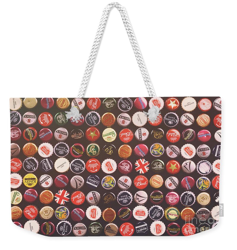 Bottle Weekender Tote Bag featuring the photograph Bottle cap backround old poster by Jane Rix