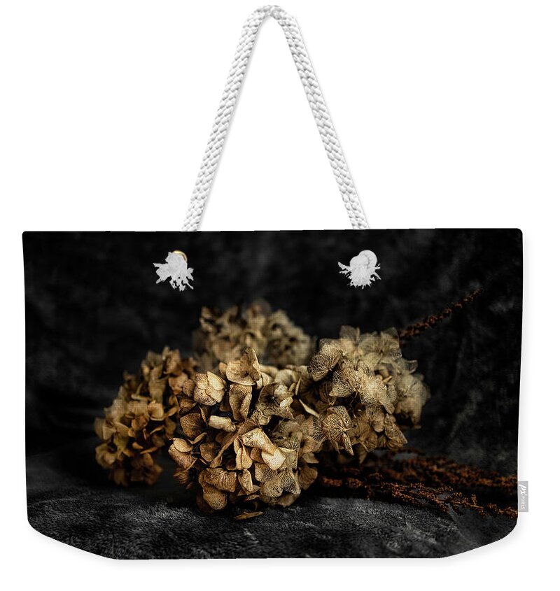 Bouguet Weekender Tote Bag featuring the photograph Bouquet of dried hydrangea flowers by MPhotographer