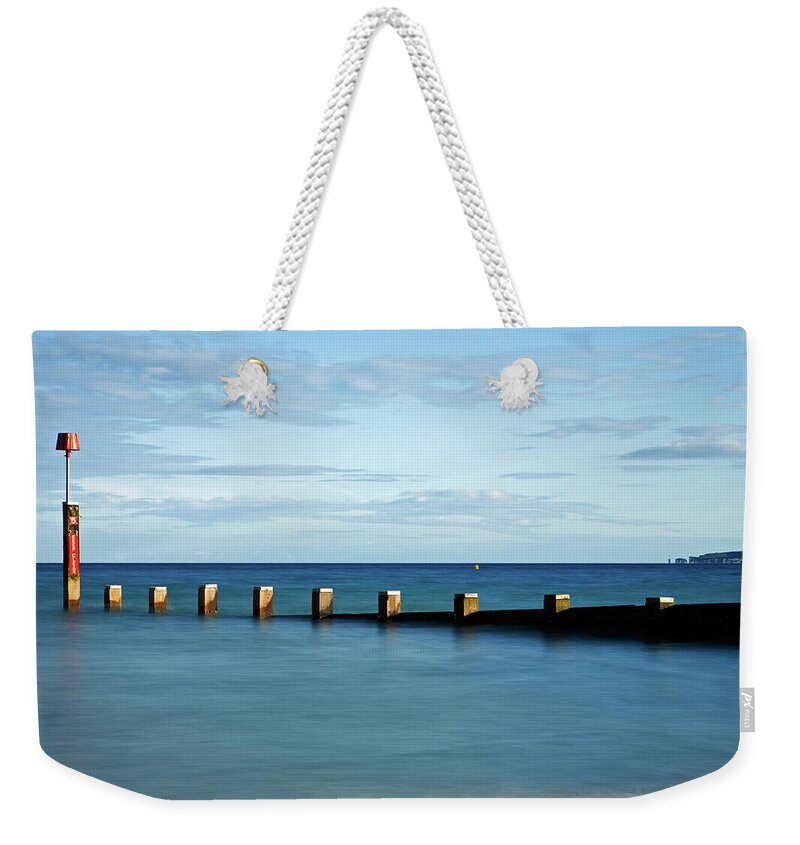 Bournemouth Weekender Tote Bag featuring the photograph Bournemouth groyne by Ian Middleton