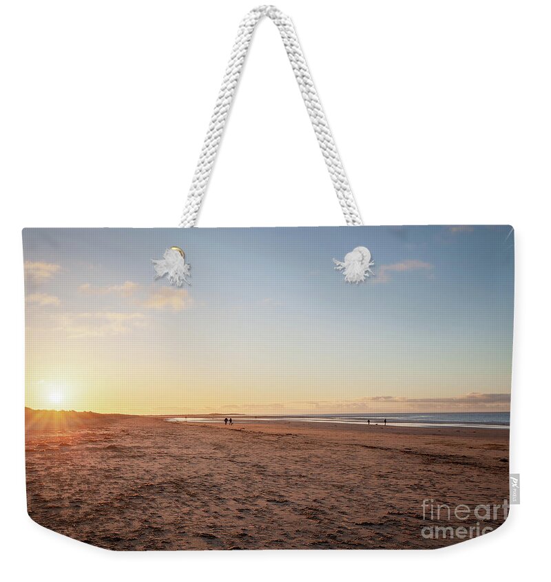 Brancaster Weekender Tote Bag featuring the photograph Brancaster Beach North Norfolk at sunset by Simon Bratt