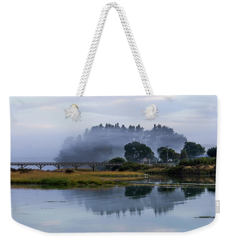 Landscape Weekender Tote Bag featuring the photograph Bridge in mist by Johannes Brienesse
