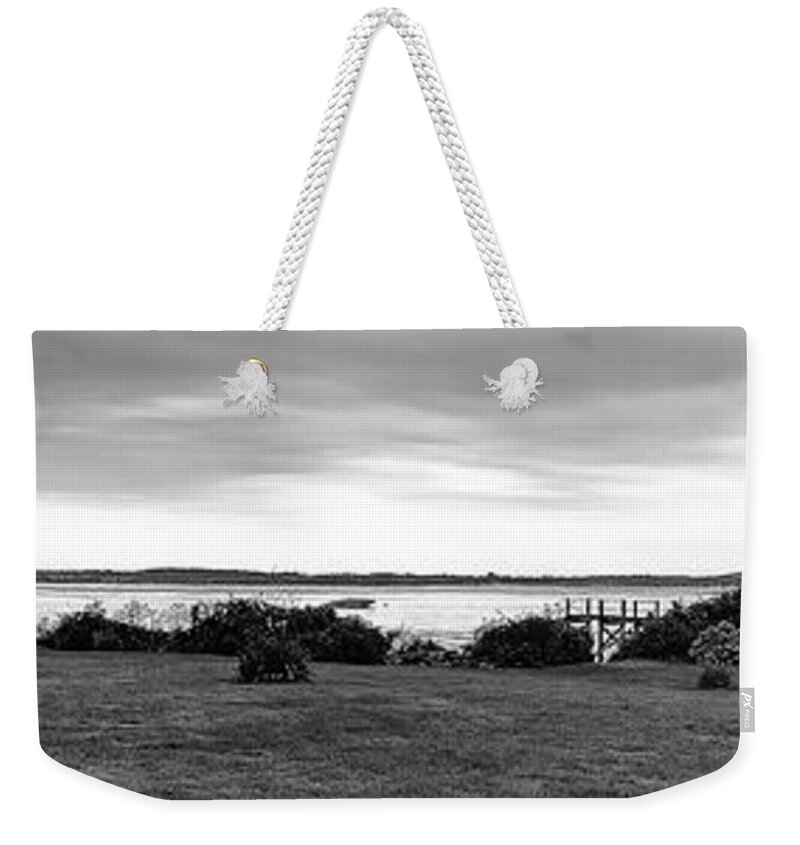 Newport Weekender Tote Bag featuring the photograph Bridge On The Bay in BW by Jim Feldman