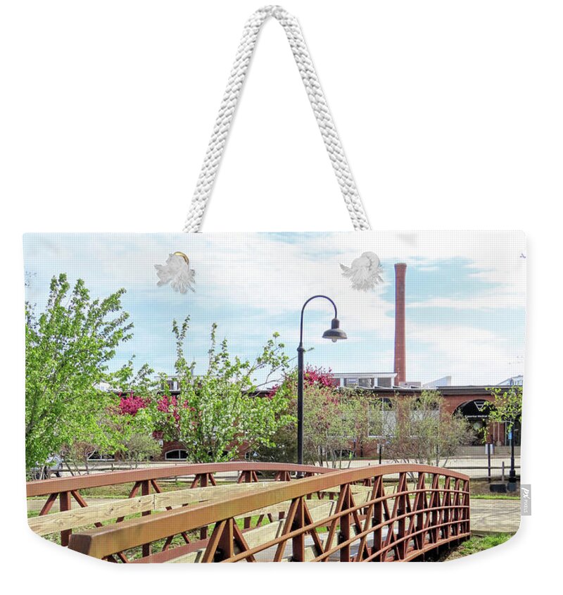 Plymouth Cordage Co Weekender Tote Bag featuring the photograph Bridge view of the smokestack by Janice Drew