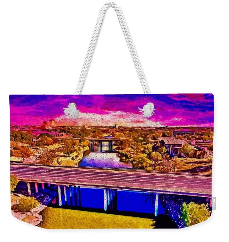 Concho River Weekender Tote Bag featuring the digital art Bridges over the Concho River in San Angelo at sunset - digital painting by Nicko Prints