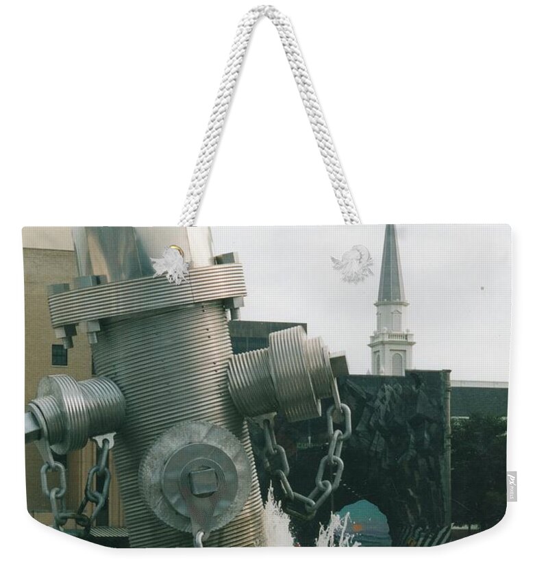 Public Art Weekender Tote Bag featuring the sculpture Busted Plug Plaza by Blue Sky