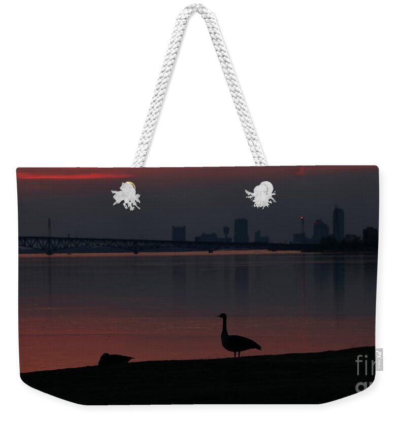 Canada Goose Weekender Tote Bag featuring the photograph By Yonder Light I Stand Watching Over My Love by Tony Lee