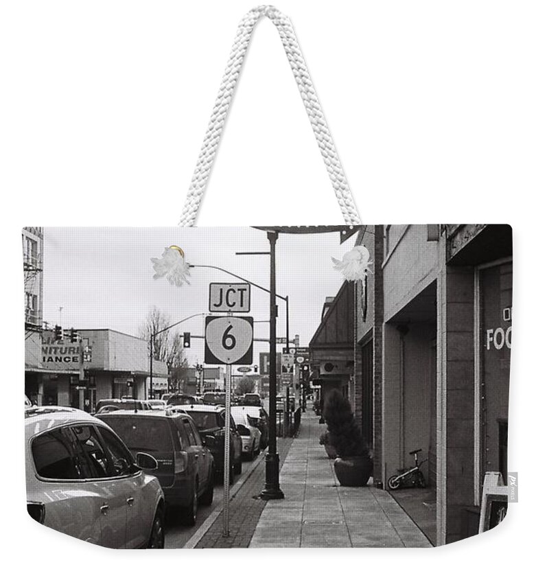 Street Photography Weekender Tote Bag featuring the photograph Cafe in Quiet Town by Chriss Pagani