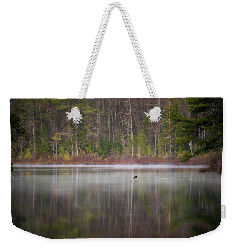 Nature Weekender Tote Bag featuring the photograph Canada Goose on a Misty Swift River Morning by William Dickman