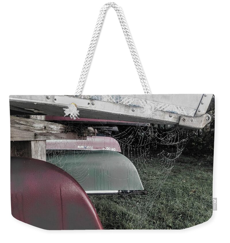  Weekender Tote Bag featuring the photograph Canoes and Spiders by Brad Nellis