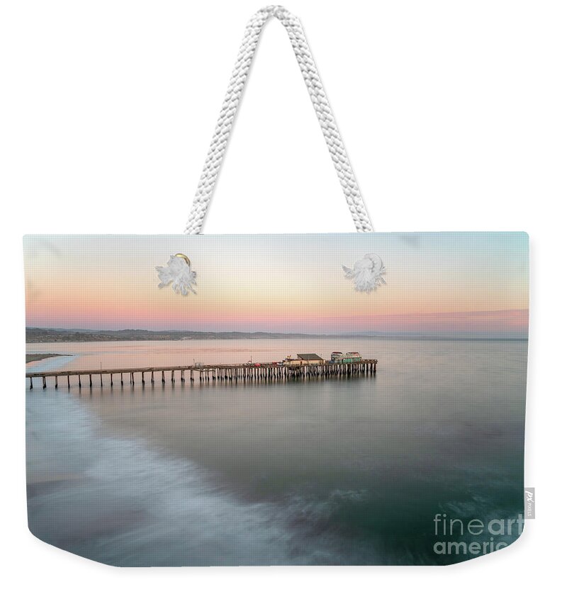 America Weekender Tote Bag featuring the photograph Capitola Wharf Pier at Sunset Photo by Paul Velgos
