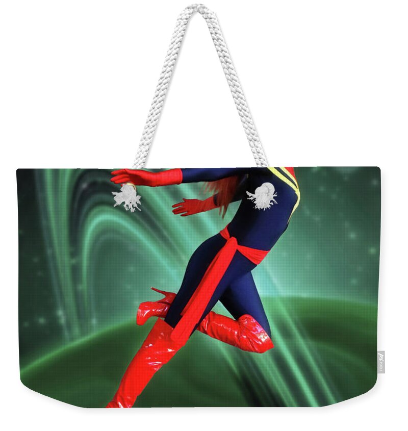 Captain Weekender Tote Bag featuring the photograph Captain Marvel In Space by Jon Volden