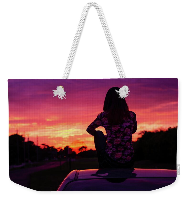 Sunset Weekender Tote Bag featuring the photograph Car Sitting at Sunset by Laura Fasulo