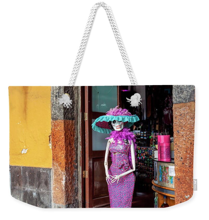 Catrina Weekender Tote Bag featuring the photograph Catrina welcomes you by Tatiana Travelways