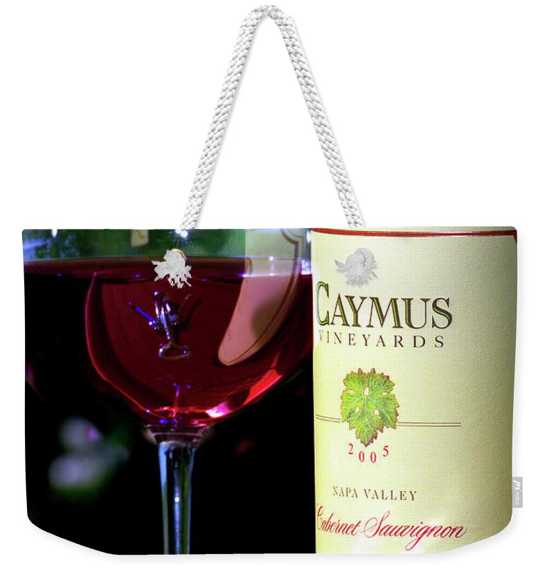 Caymus Weekender Tote Bag featuring the photograph Caymus Wine Bottle by Kenneth Lane Smith