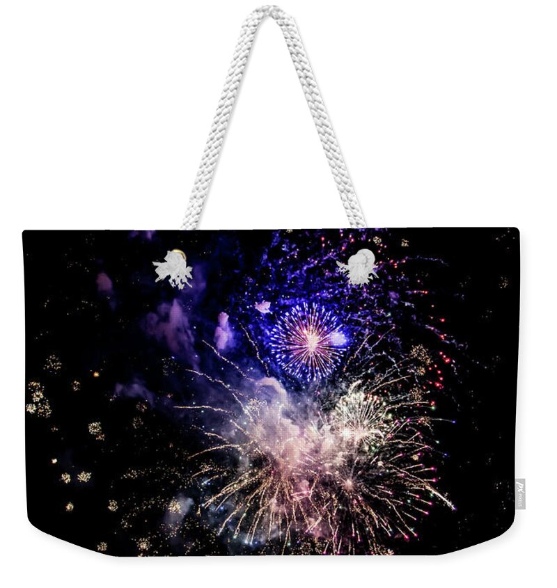 Celebration With Bright Colorful Fireworks Over Black Sky Weekender Tote Bag featuring the photograph Celebration With Bright Colorful Fireworks Over Black Sky by Andreas Berthold