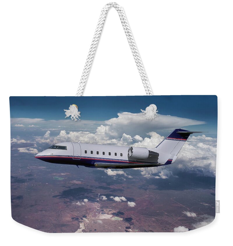 Challenger Business Jet Weekender Tote Bag featuring the mixed media Challenger Corporate Jet by Erik Simonsen