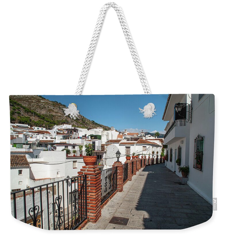 Jenny Rainbow Fine Art Weekender Tote Bag featuring the photograph Charming Tiny White Streets of Mijas 1 by Jenny Rainbow