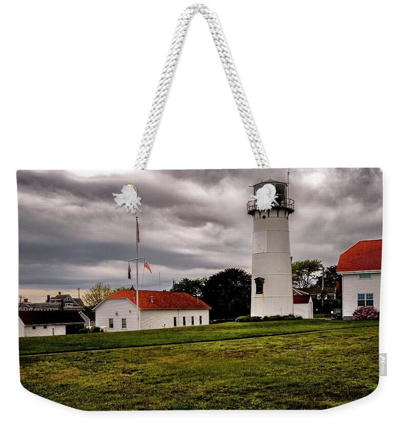Orange Massachusetts Weekender Tote Bag featuring the photograph Chatham Coast Guard Station by Tom Singleton