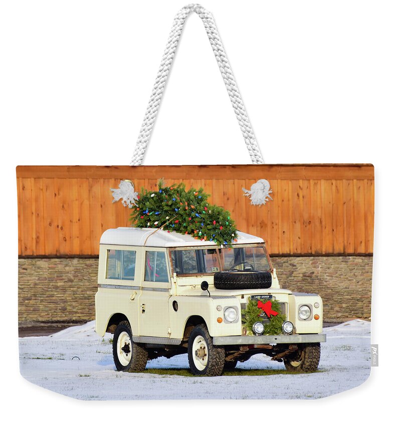 Land Rover Weekender Tote Bag featuring the photograph Christmas Land Rover by Nicole Lloyd