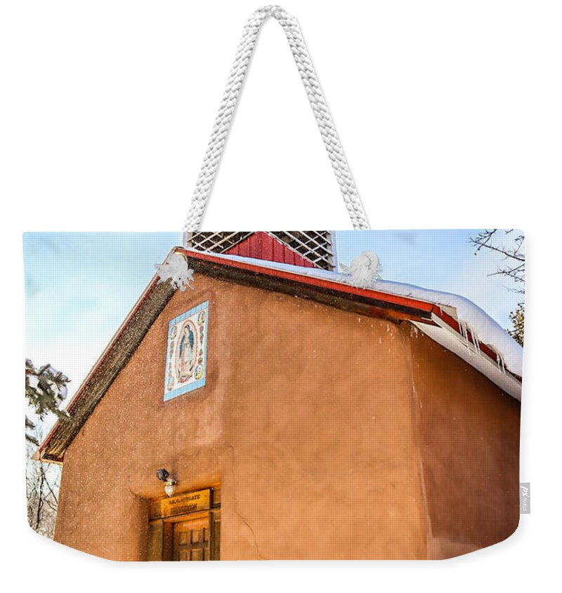 Taos Weekender Tote Bag featuring the photograph Chapel from Ranchitios by Elijah Rael