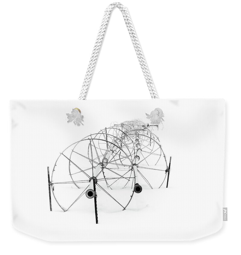 Lassen Weekender Tote Bag featuring the photograph Circles and Spokes in Snow by Mike Lee