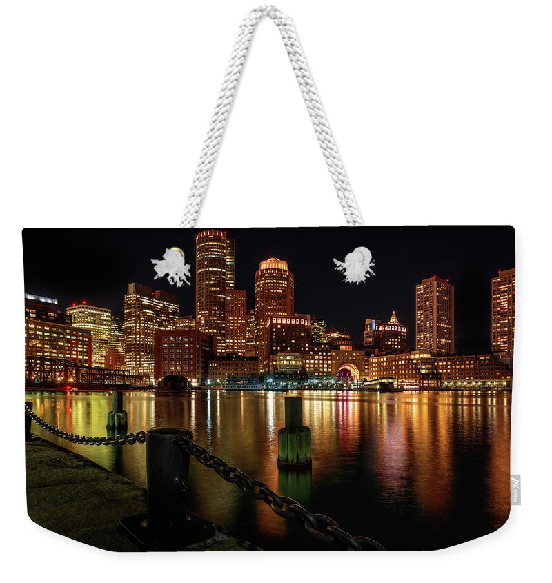 New England.night Weekender Tote Bag featuring the photograph City with a Soul- Boston Harbor by Tim Bryan