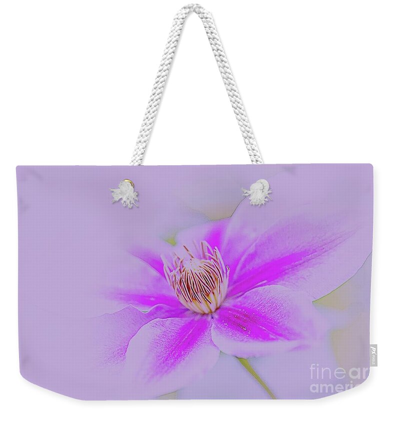 Flower Weekender Tote Bag featuring the photograph Clematis by Cathy Donohoue