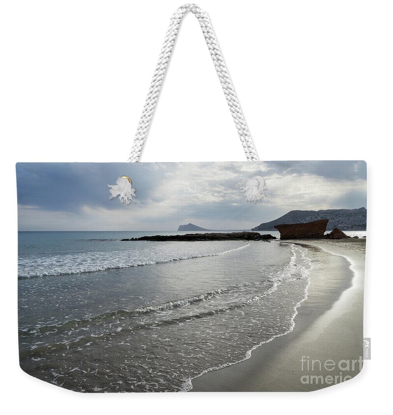 Mediterranean Coast Weekender Tote Bag featuring the photograph Clouds, light and water by Adriana Mueller