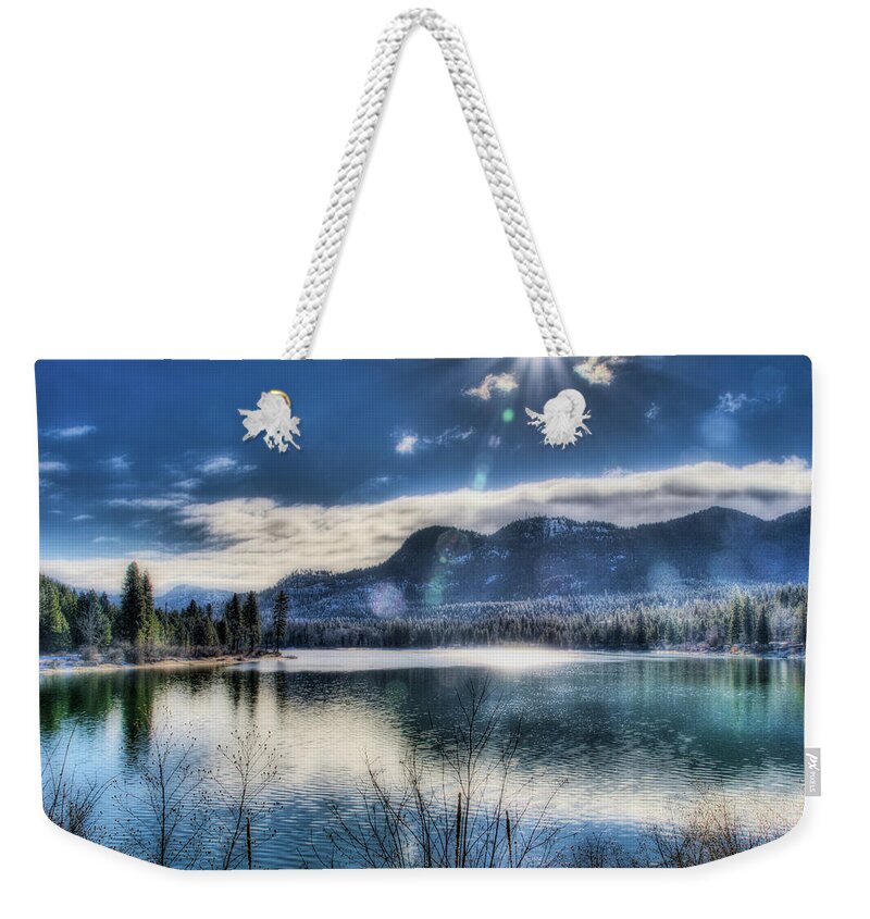 River Weekender Tote Bag featuring the photograph Cold Day on the Pend Oreille by Dan Eskelson