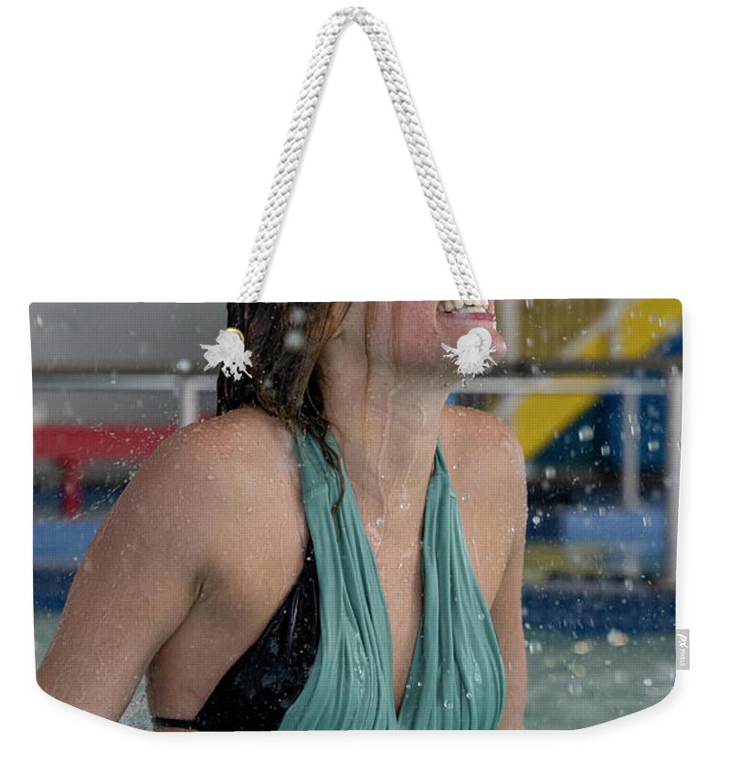 Fun Weekender Tote Bag featuring the photograph Cold smile as water poring over model by Dan Friend