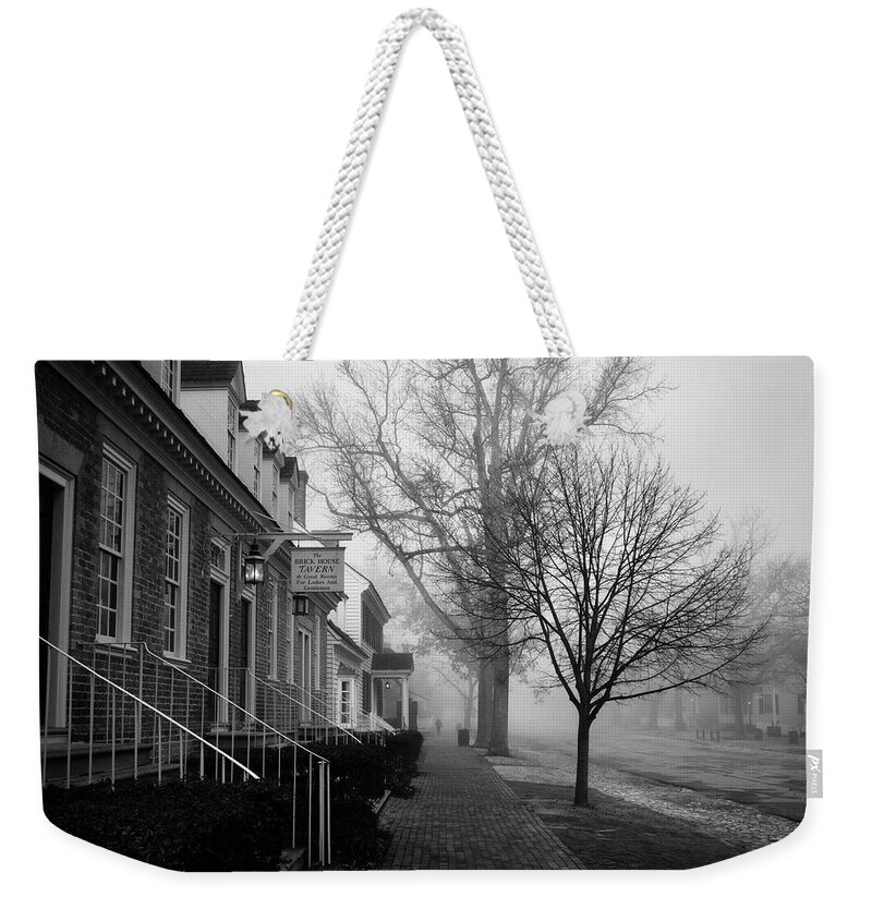 Colonial Williamsburg Weekender Tote Bag featuring the photograph Colonial Williamsburg in Misty March by Rachel Morrison