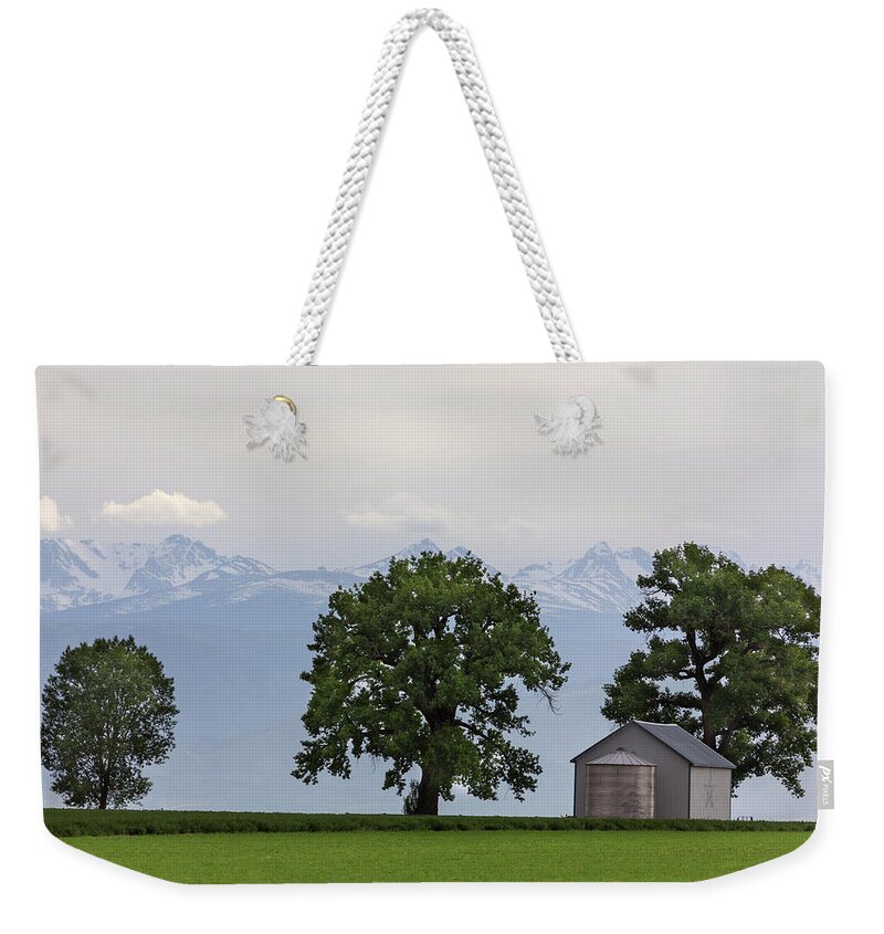 Colorado Weekender Tote Bag featuring the photograph Colorado Farm Lands and Rocky Mountain Peaks by James BO Insogna