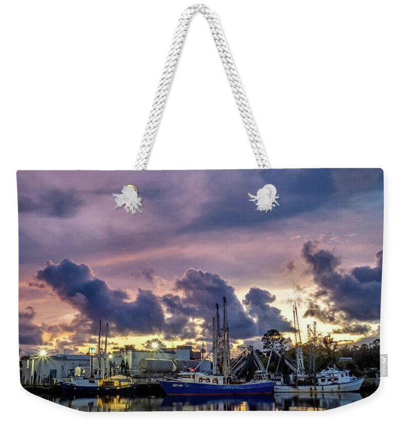 Clouds Weekender Tote Bag featuring the photograph Colorful and Powerful Bayou Sunset by Brad Boland