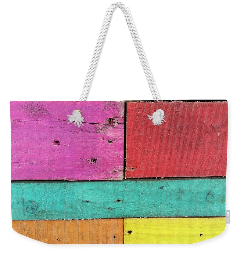 Colorful Boards Caribbean Pink Red Yellow Blue Orange Weekender Tote Bag featuring the photograph Colorful Boards in the Caribbean by David Morehead