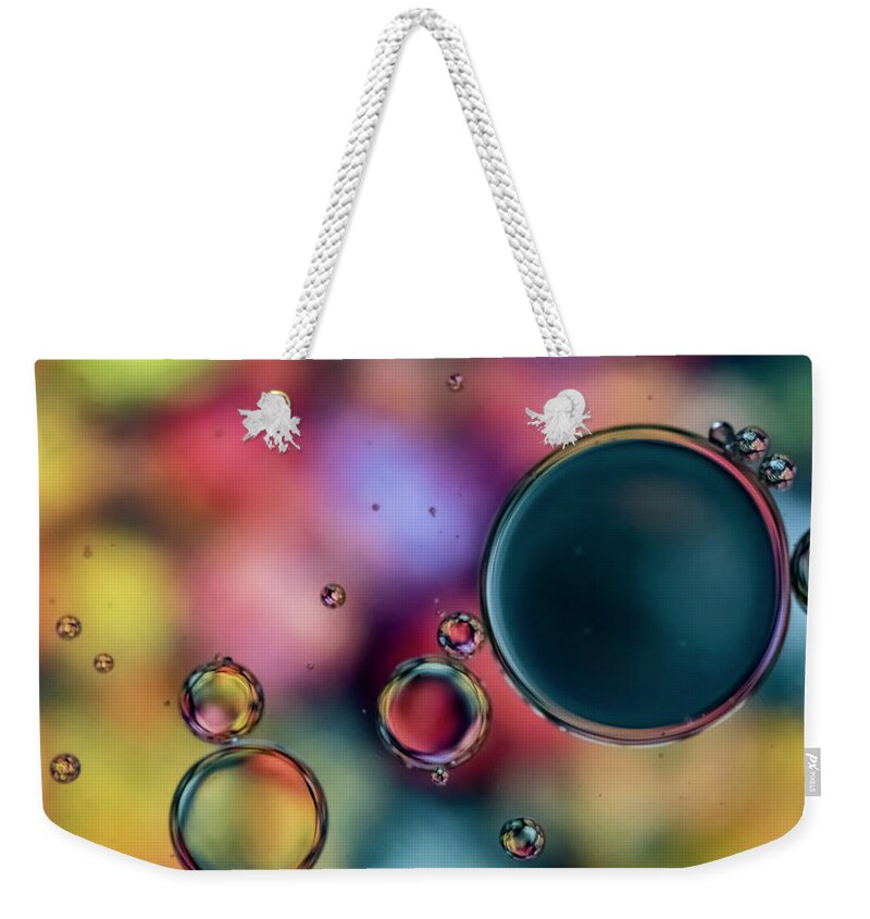 Oil Weekender Tote Bag featuring the photograph Colorful Bubbles by Cathy Kovarik