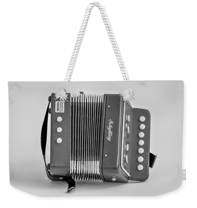 Concertina Weekender Tote Bag featuring the photograph Concertina in Black and White by Bill Cannon
