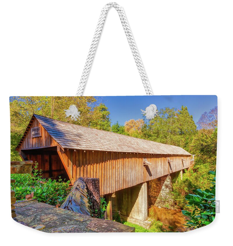 Atlanta Weekender Tote Bag featuring the photograph Concord Covered Bridge Caretaker View by Donna Twiford