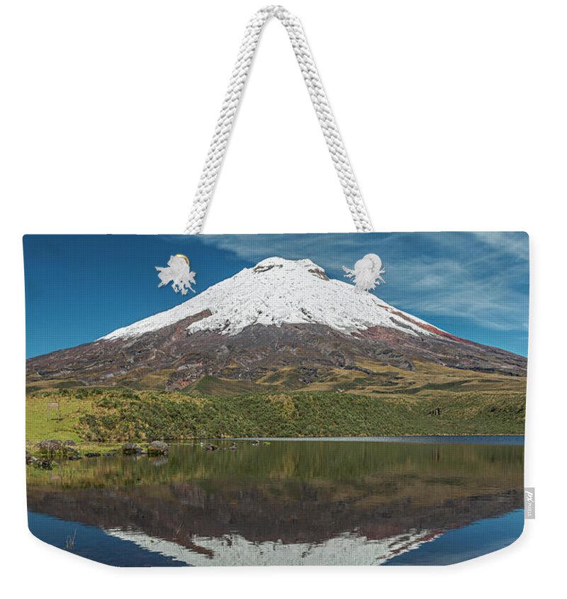 Andes Weekender Tote Bag featuring the photograph Cotopaxi and his reflection by Henri Leduc
