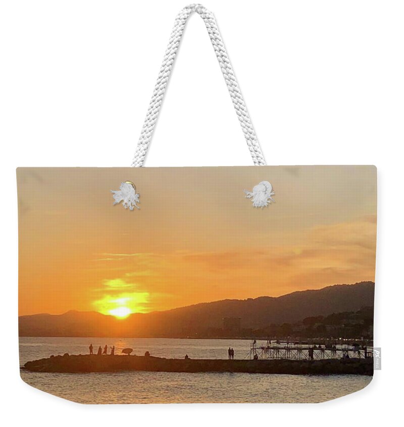 Cannes Weekender Tote Bag featuring the photograph Coucher de Soleil a Cannes by Medge Jaspan