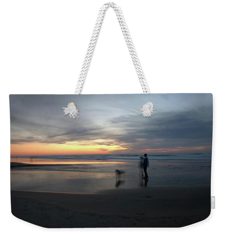 Roads End State Park Weekender Tote Bag featuring the photograph Couple and Dog at Roads End by John Parulis